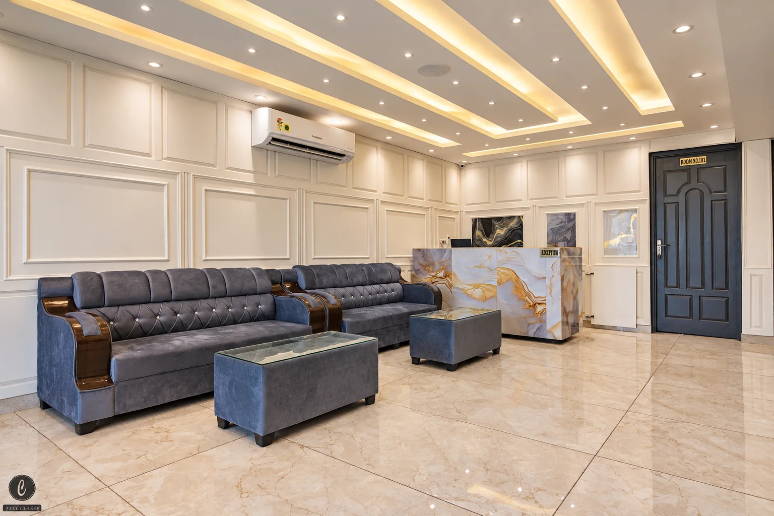 Classy Castle by Nasmu Stays reception lounge with upholstered seating and a reception desk